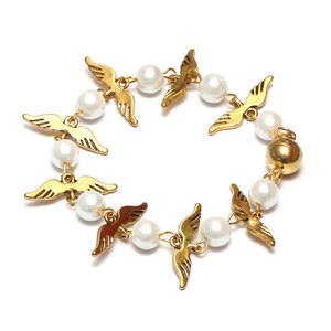 Fashionable Glass Pearl Link with Golden Tone Wings Magnetic Bracelet