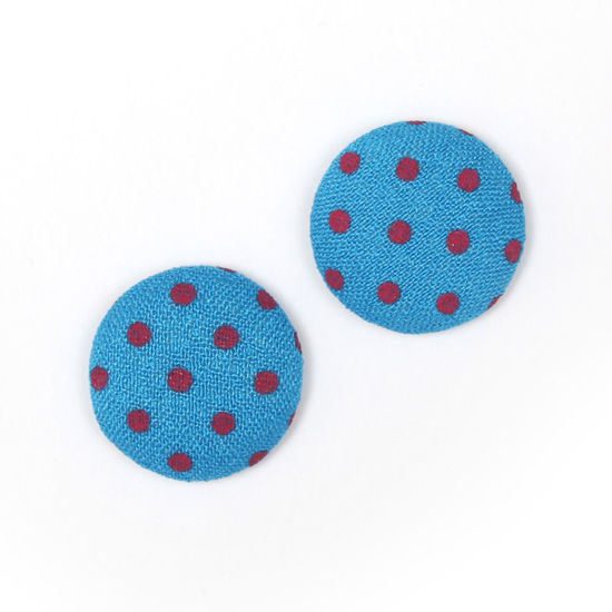 Blue polka dot fabric covered round button