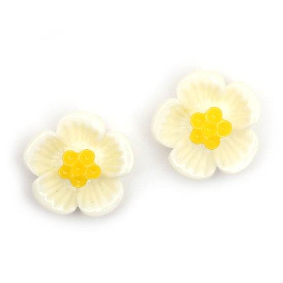 White plum blossom flower with gold-tone clip earrings