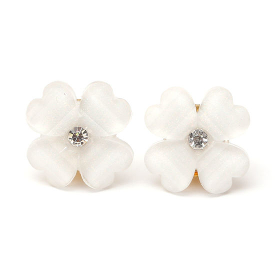 White crystal effect and rhinestone clover with gold-coloured clips
