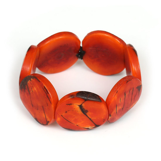 Handgemachtes, elastisches Armband aus orangen Taguascheiben